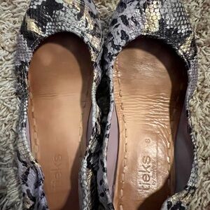 Lavender snake tieks, size 8. Overall good condition!